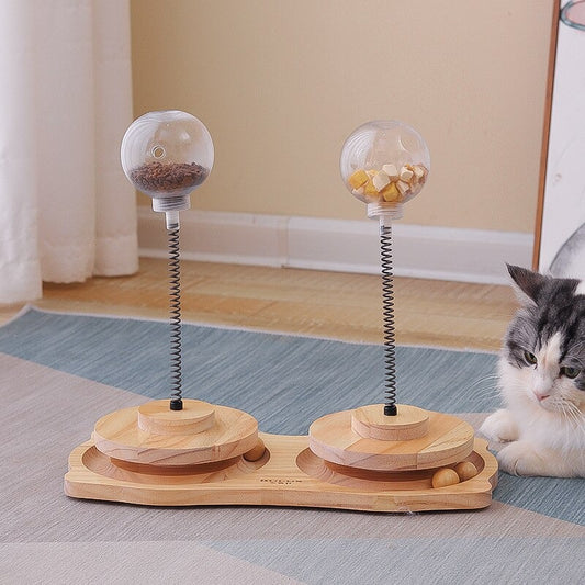 Spring-Loaded Treat Dispenser Toy for Cats