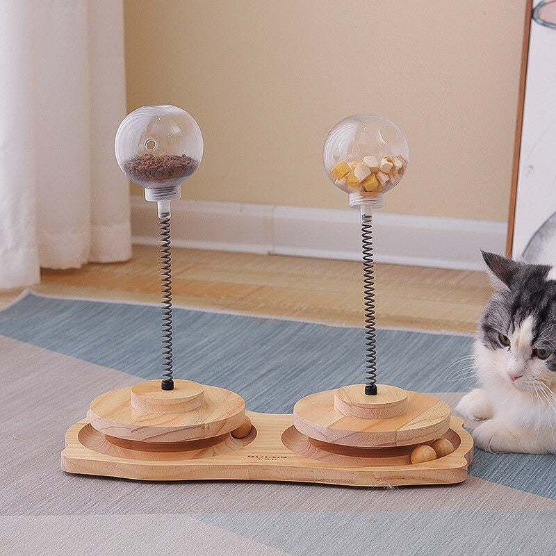 Spring-Loaded Treat Dispenser Toy for Cats